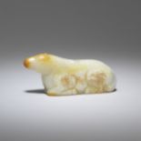 A pale green and russet jade carving of a horse Probably 17th/18th century