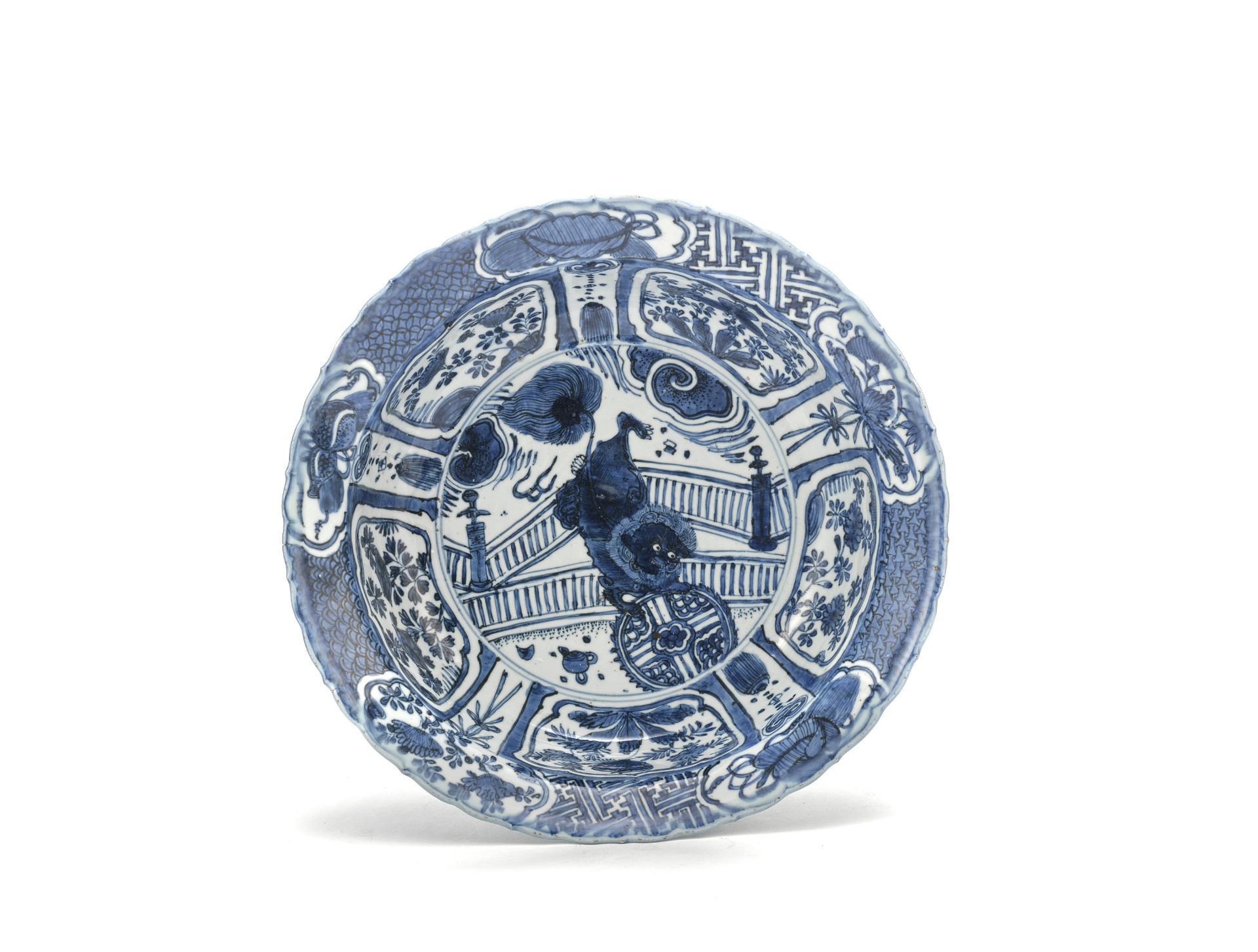 A blue and white Kraak 'Buddhist lions' barbed-rim basin Wanli