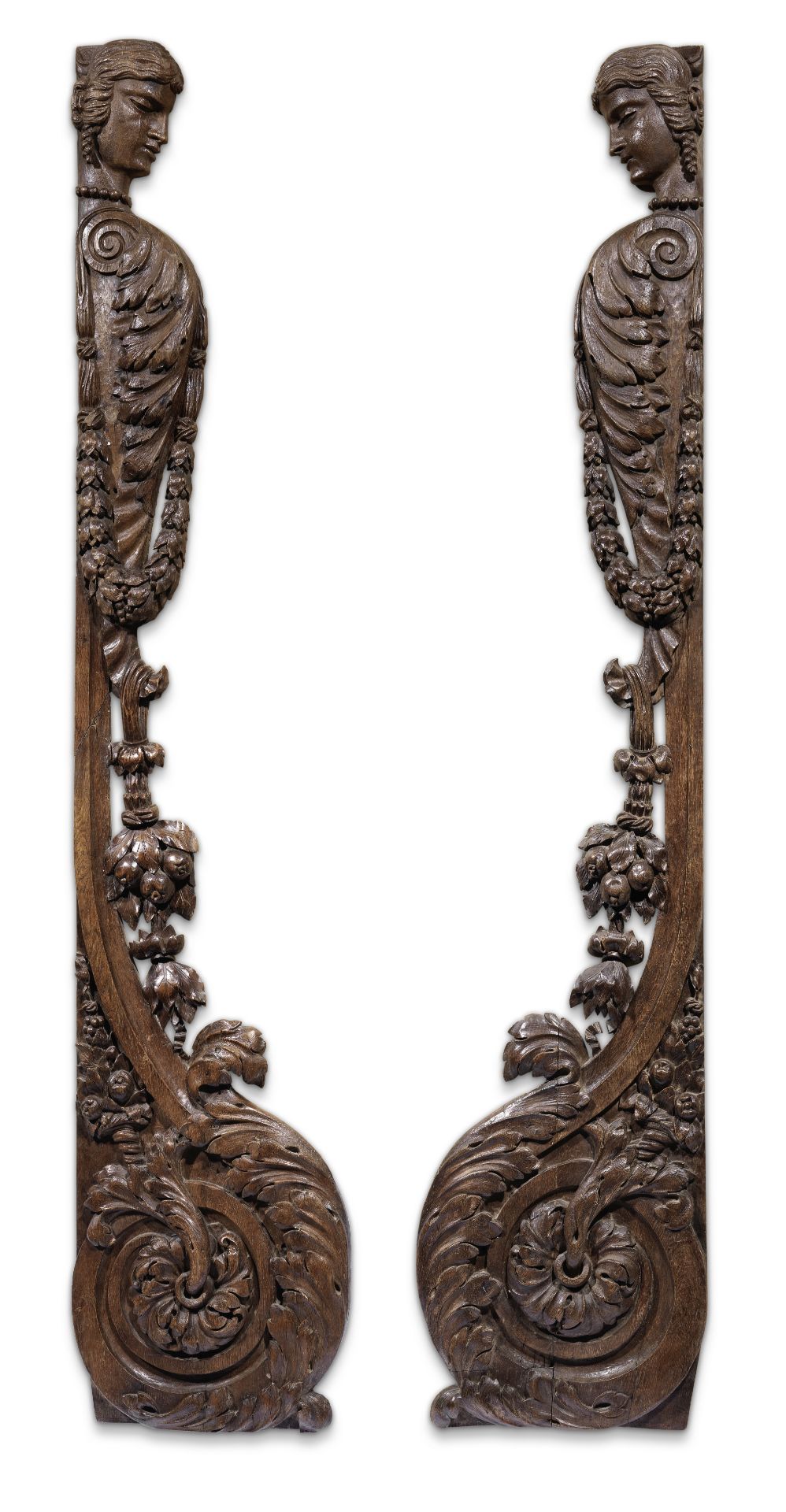 A pair of large 17th century and later carved oak architectural elements (2)