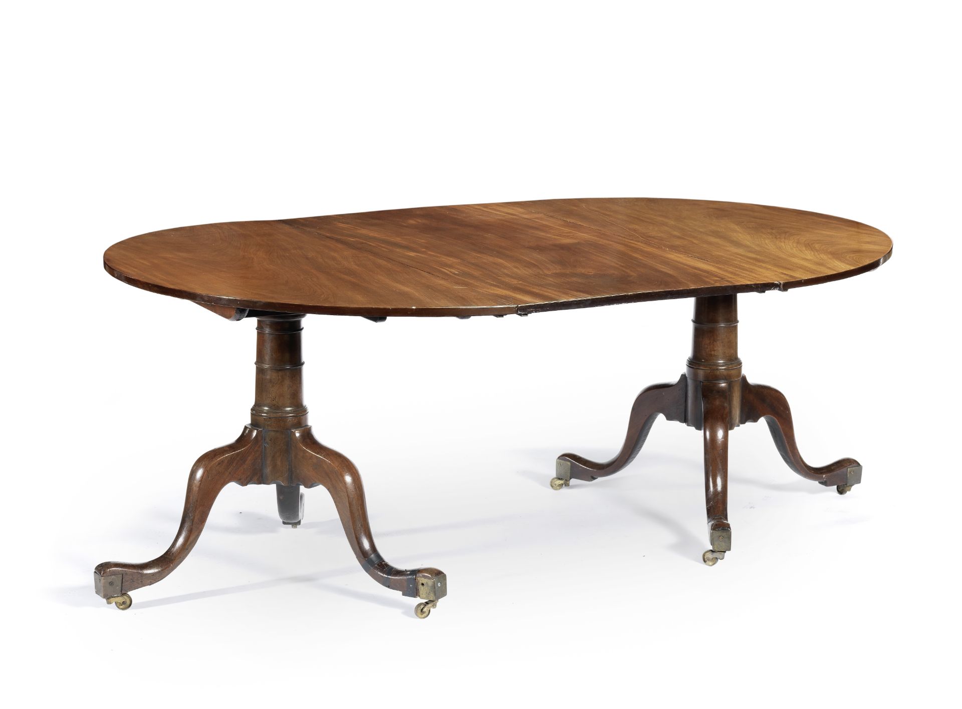 A mahogany twin-Pedestal Dining Table In the George II style