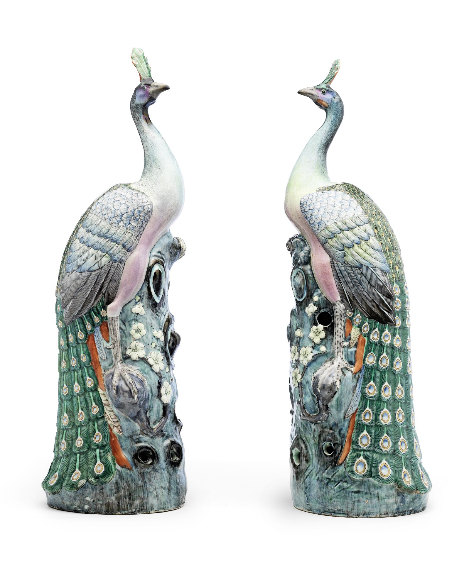 A pair of large famille rose models of peacocks One peacock with impressed four-character Pan Yun...