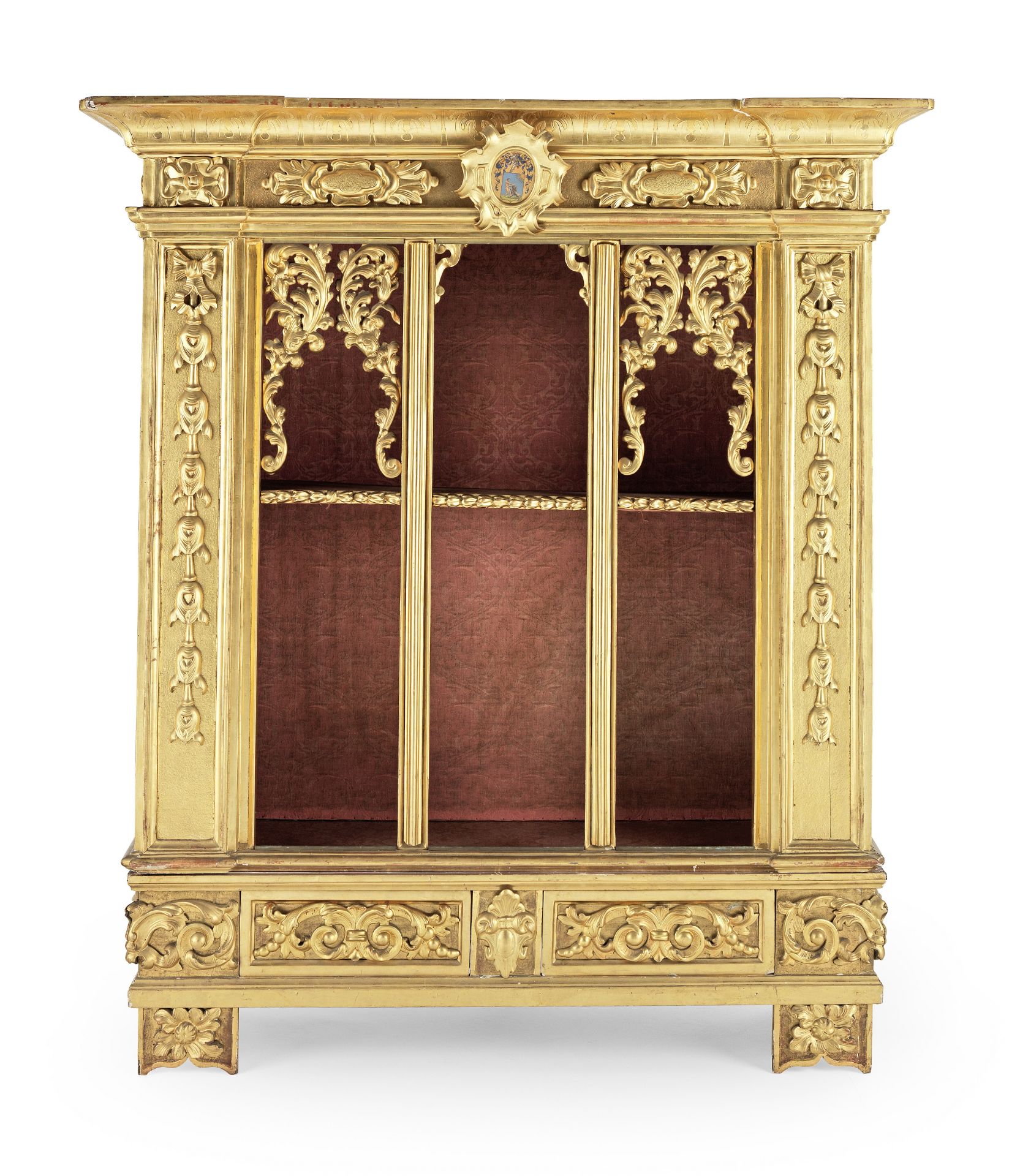 An Italian second quarter 19th century giltwood and gilt gesso display cabinet