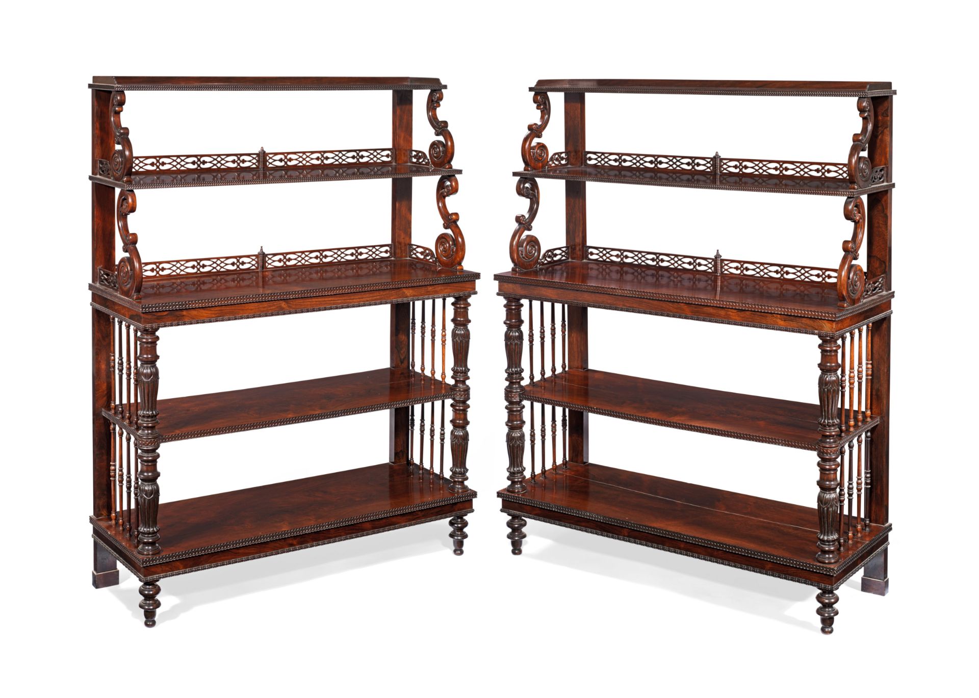 A pair of early Victorian rosewood five-tier open display buffets in the manner of Gillows (2)