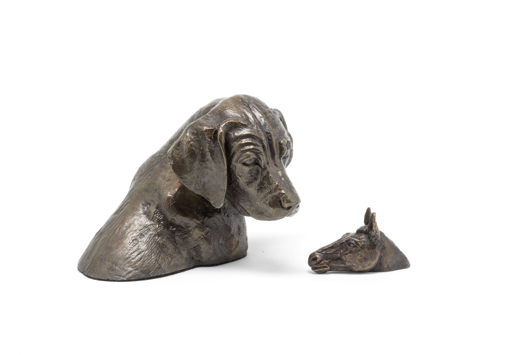 Sally Arnup (British, born 1930): A bronze model of a puppy's head and a miniature bronze model o...