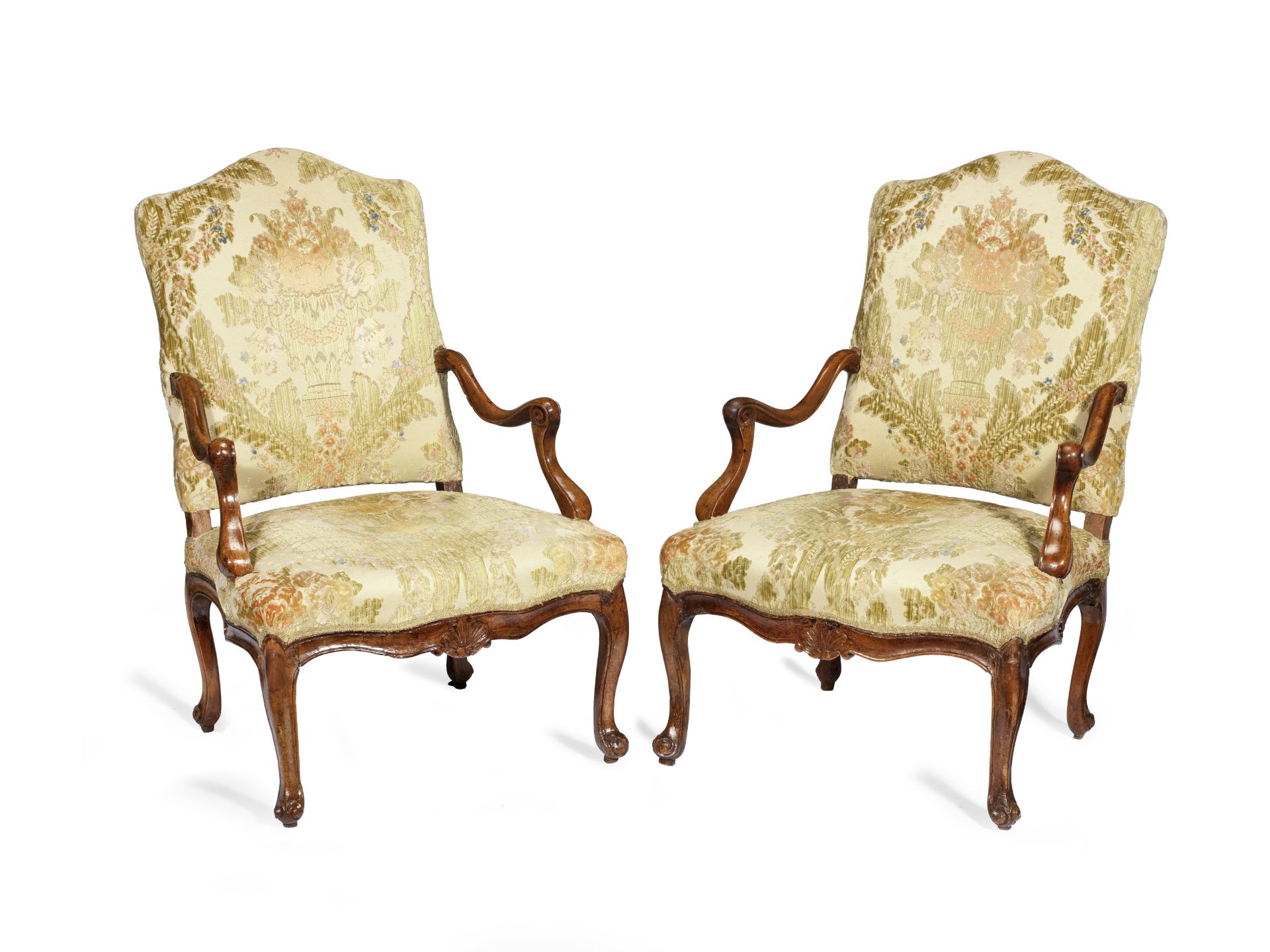 A pair of 18th century French provincial Louis XV solid walnut fauteuils (2)