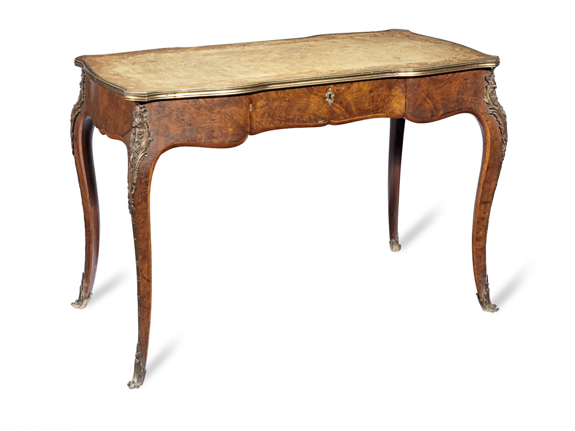 A mid Victorian walnut and marquetry writing table in the Louis XV style