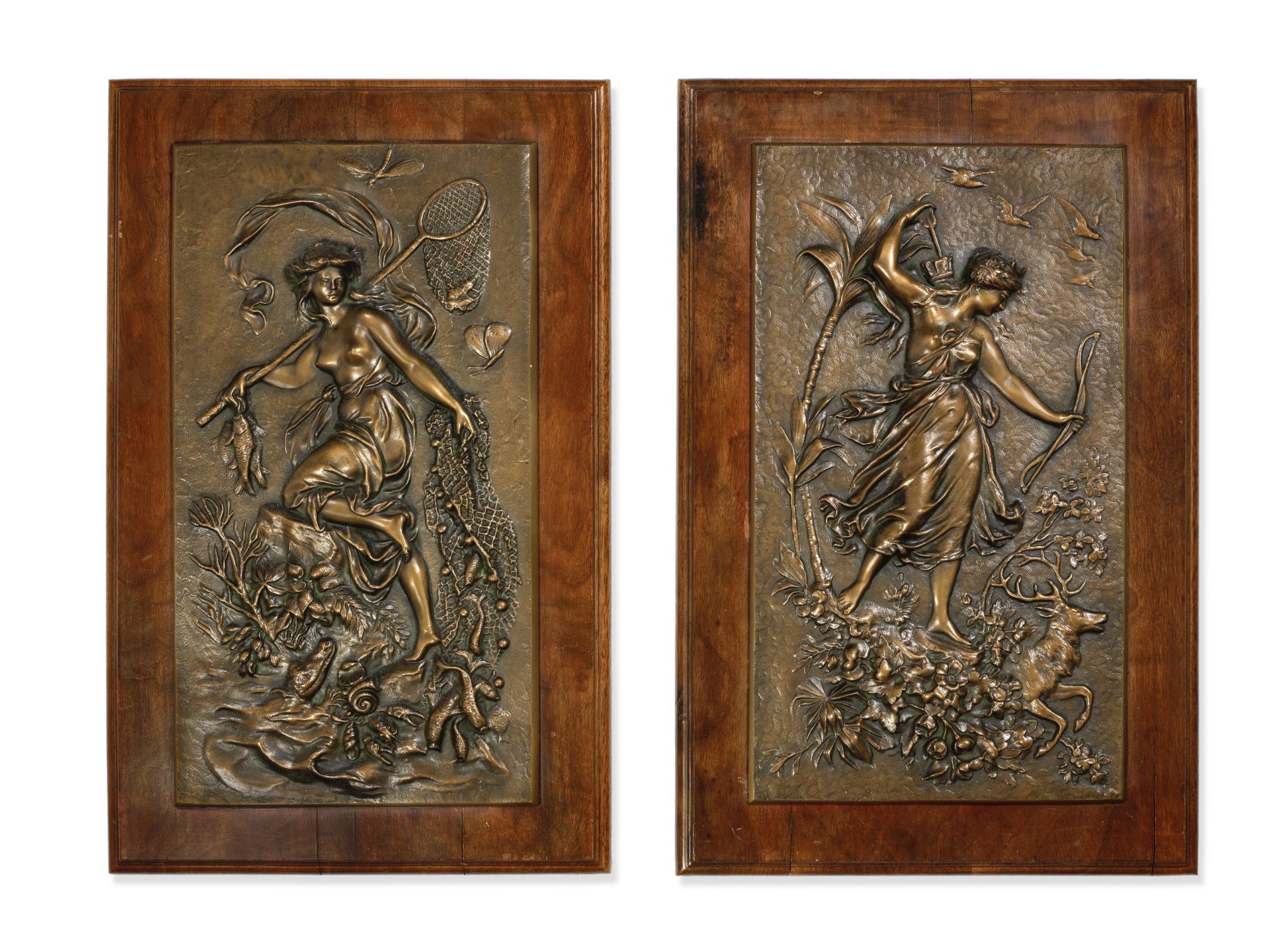 A pair of late 19th/early 20th century Continental patinated bronze relief cast figural plaques d...