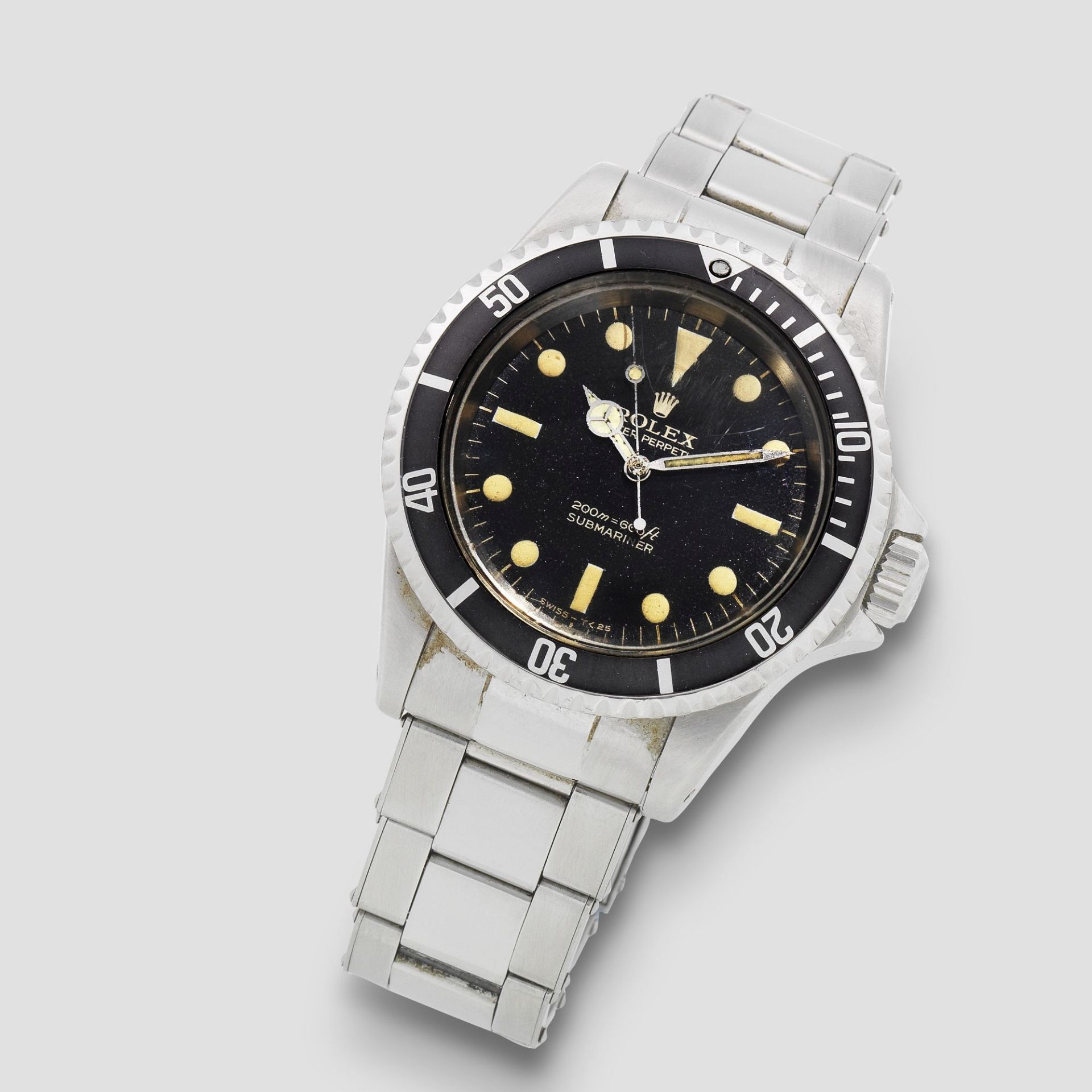 Rolex. A stainless steel automatic bracelet watch with gilt dial Submariner, Ref: 5513, Circa 1966