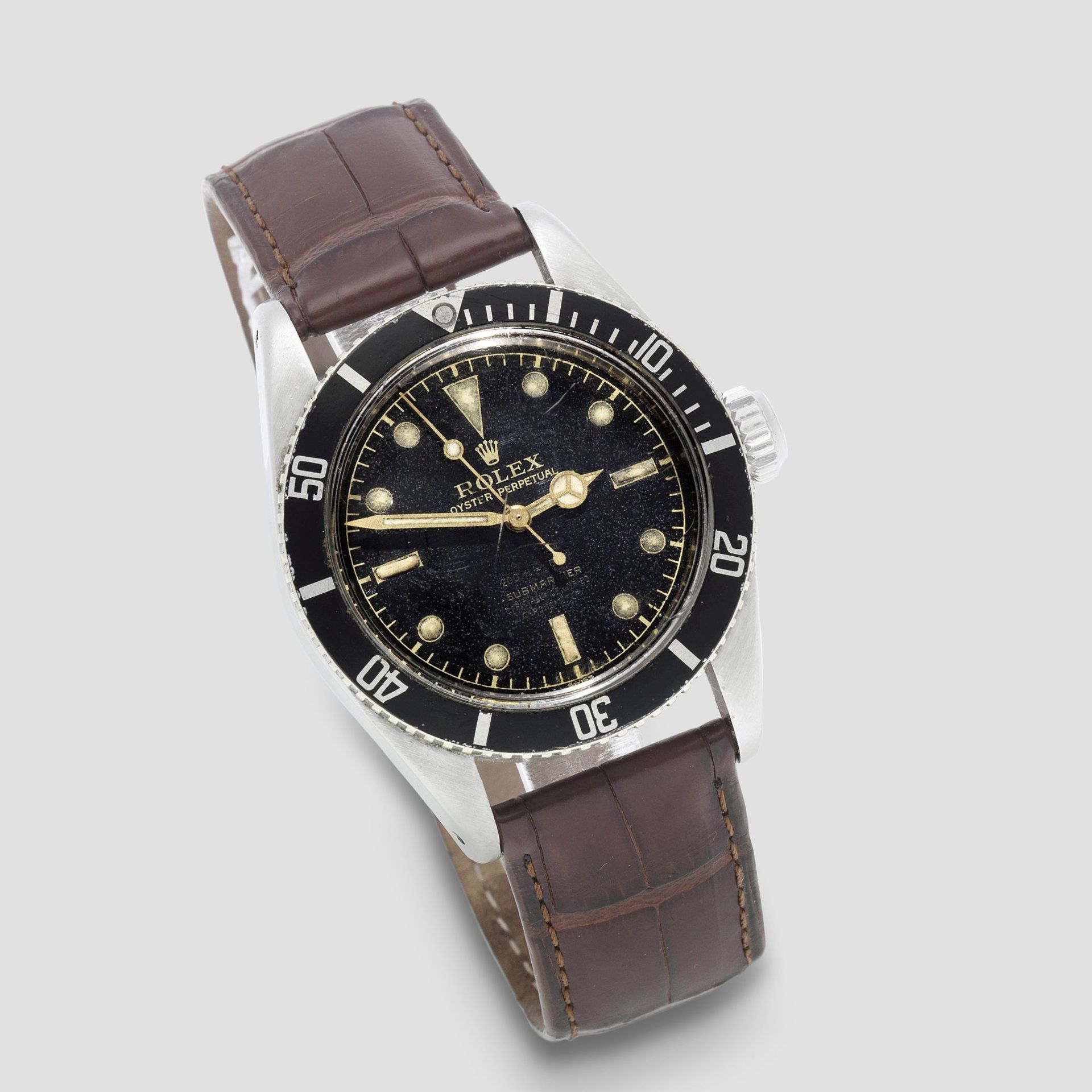 Rolex. A fine and rare stainless steel automatic wristwatch with gilt 4 line dial and big crown ...