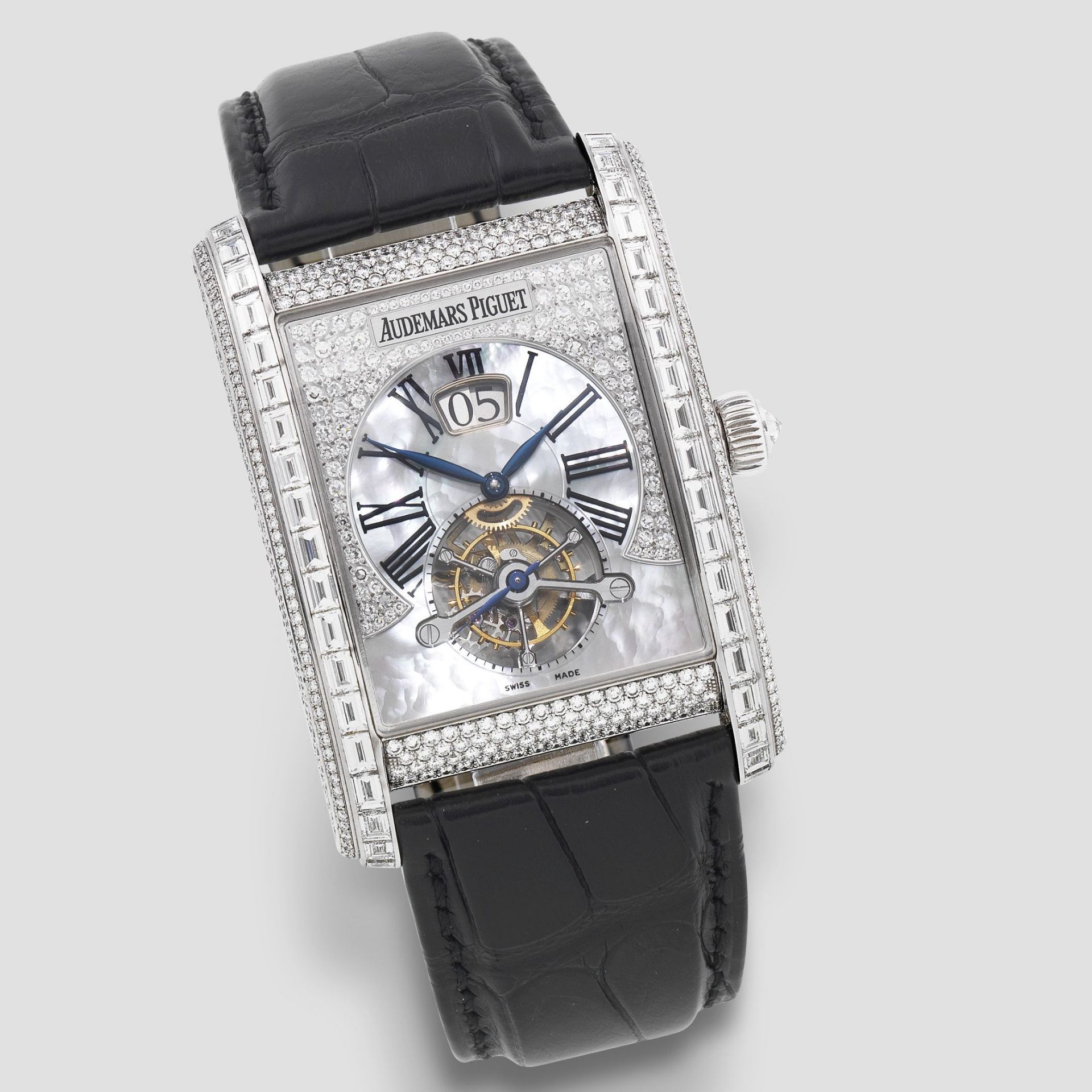 Audemars Piguet. A fine 18K white gold, mother of pearl and diamond set manual wind tourbillon wr...