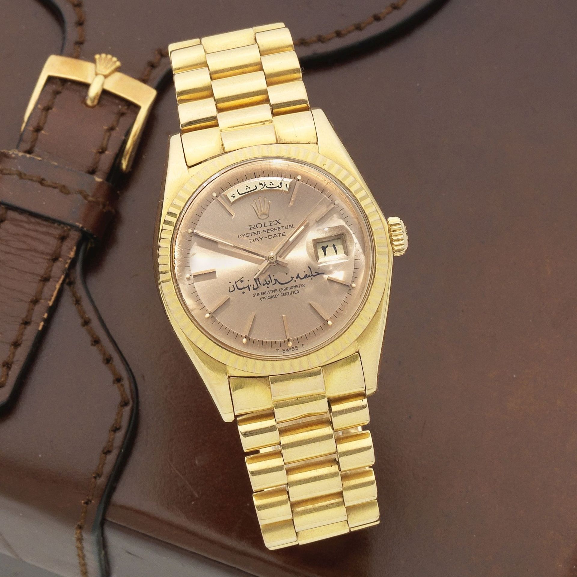 Rolex. A fine and rare 18K gold automatic calendar bracelet watch with Arabic dial inscribed 'Kha...