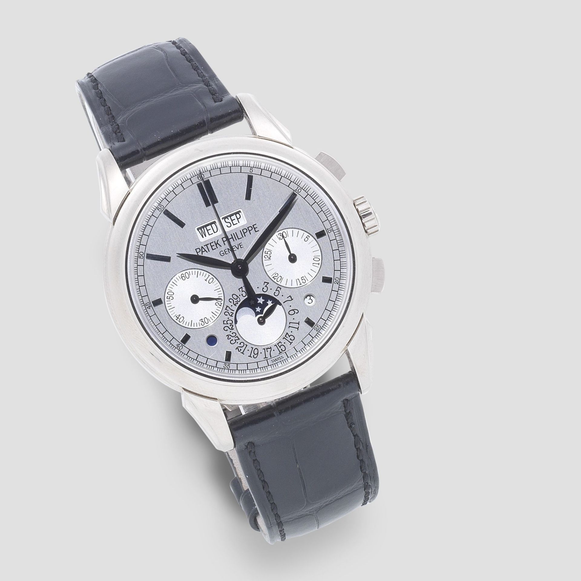 Patek Philippe. A fine and rare 18K white gold manual wind perpetual calendar chronograph wristwa...