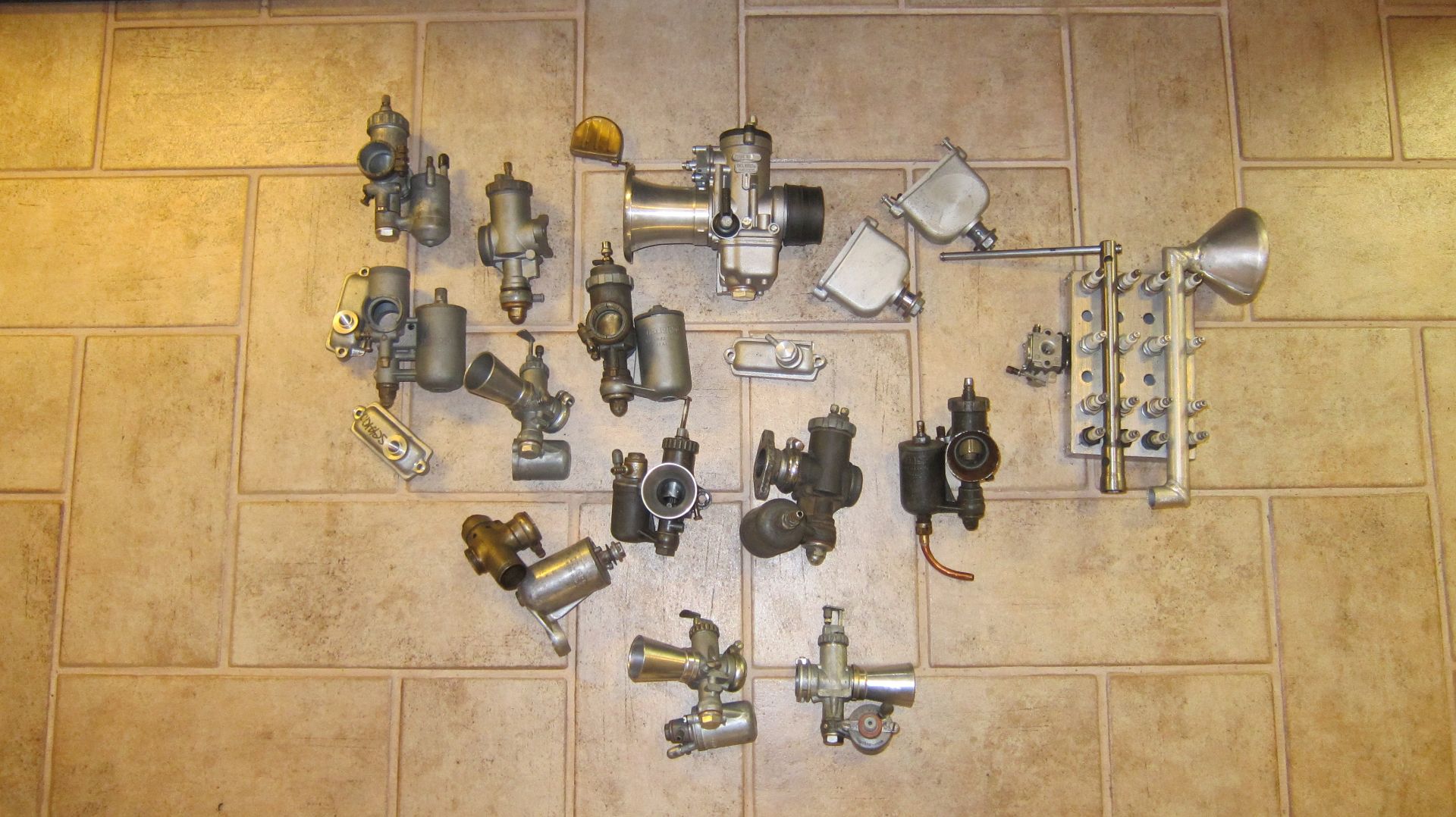 A quantity of carburettors ((Qty))