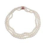 Three-strand cultured pearl necklace with a ruby clasp