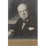 CHURCHILL (WINSTON) Portrait photograph by Walter Stoneman, SIGNED BY CHURCHILL, [1 April 1942, d...