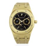 Audemars Piguet. An 18K gold automatic calendar bracelet with moon phase Royal Oak, Ref: 25594, ...