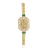 Chopard. A lady's 18K gold, diamond and emerald set quartz cocktail bracelet watch Ref: 104487, P...