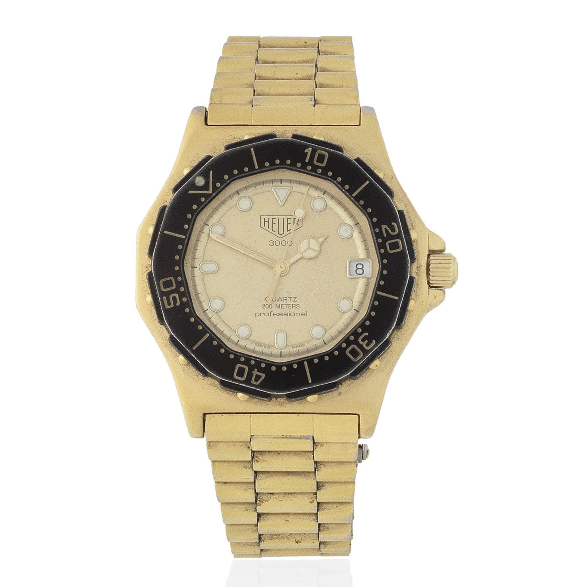 Heuer. A gold plated and steel quartz calendar bracelet watch 3000, Ref: 937.406, Circa 1985