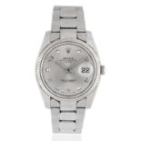 Rolex. A stainless steel and 18K white gold automatic calendar bracelet watch with diamond set di...