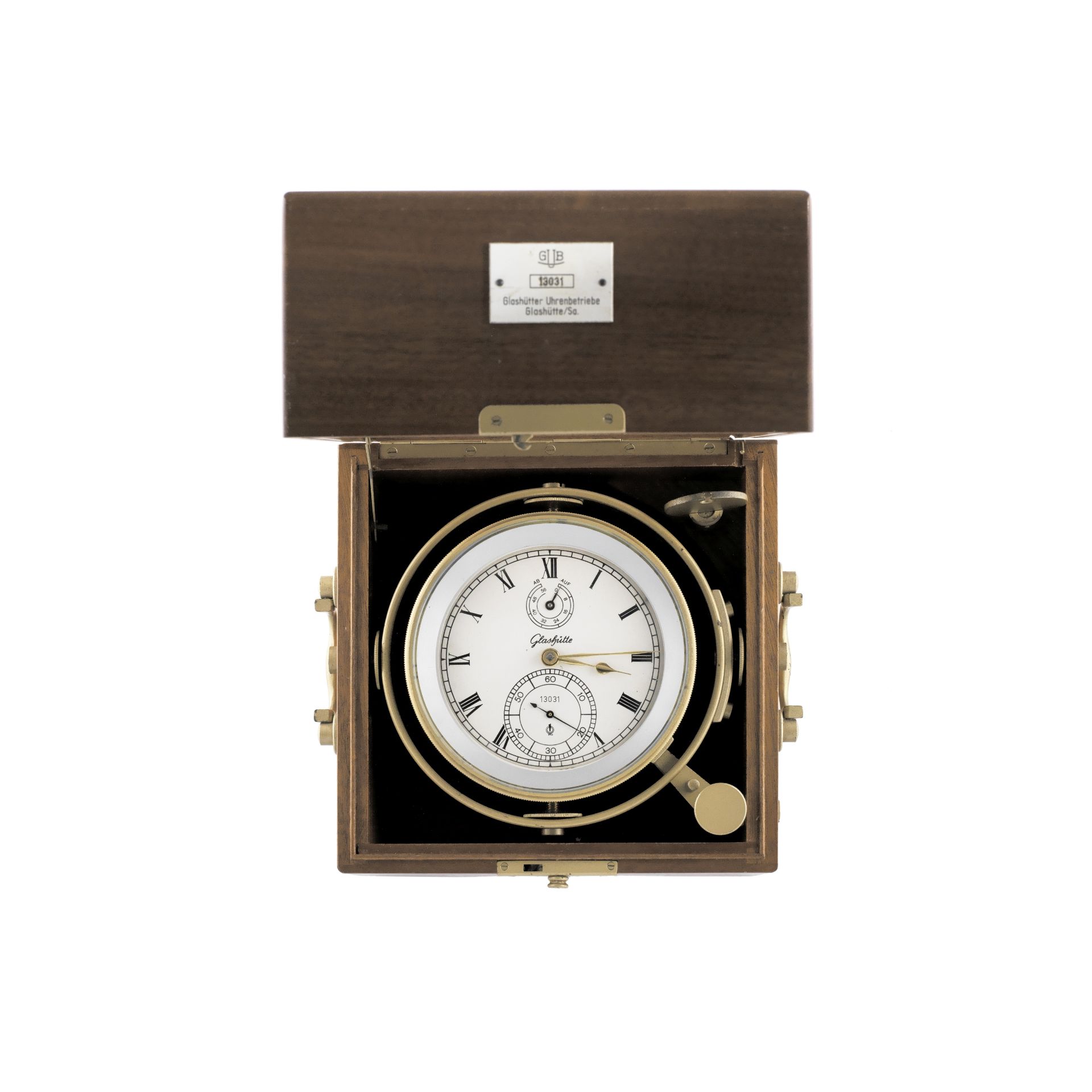 GUB Glashütte. A brass cased marine deck chronometer gimbal mounted in a wooden deck box Circa 1960
