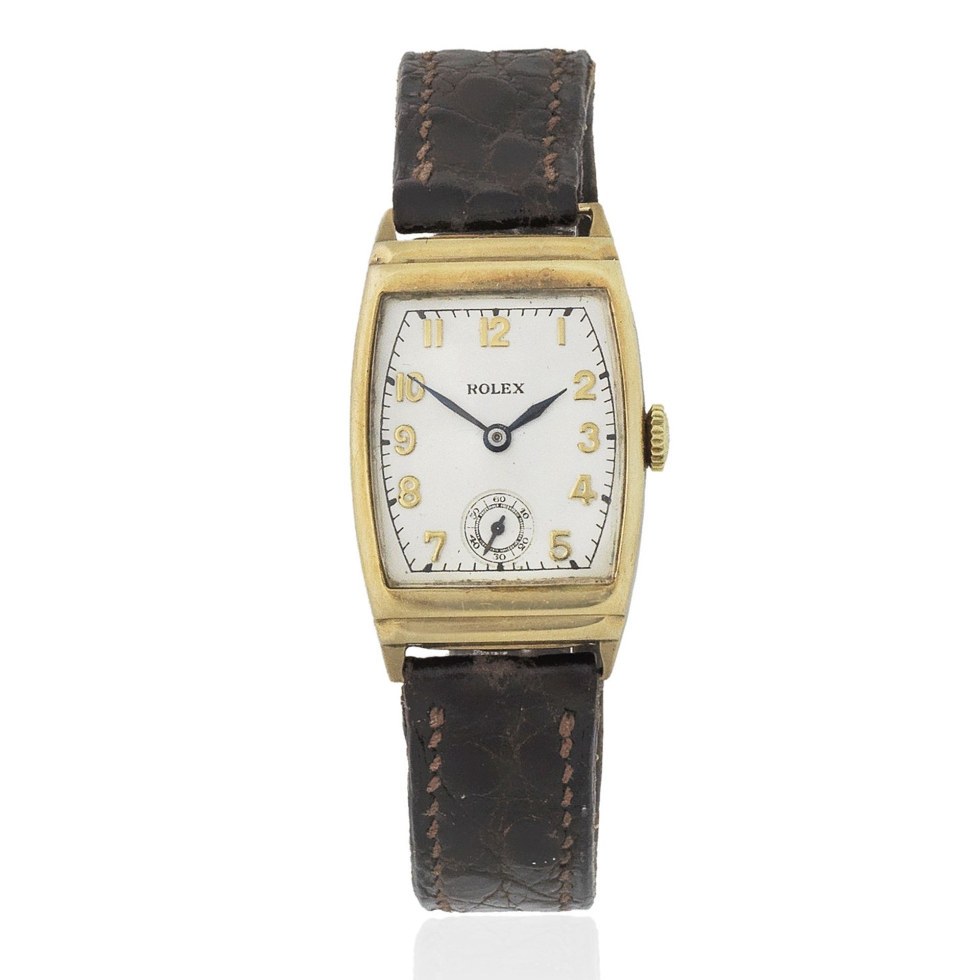 Rolex. A 9K gold manual wind tonneau form wristwatch Ref: 2387, Circa 1930