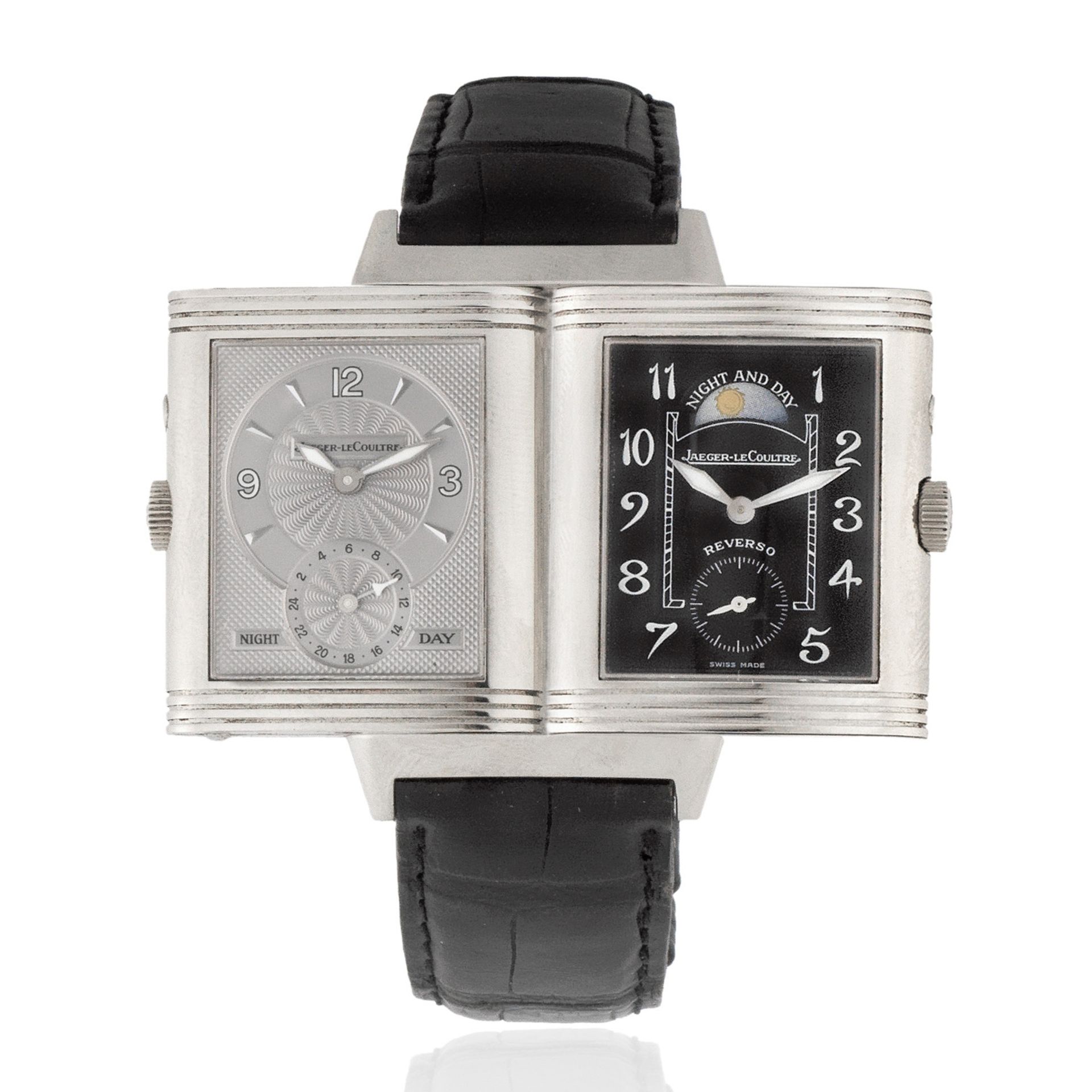 Jaeger-LeCoultre. An 18K white gold manual wind reversible rectangular wristwatch with moon phase...