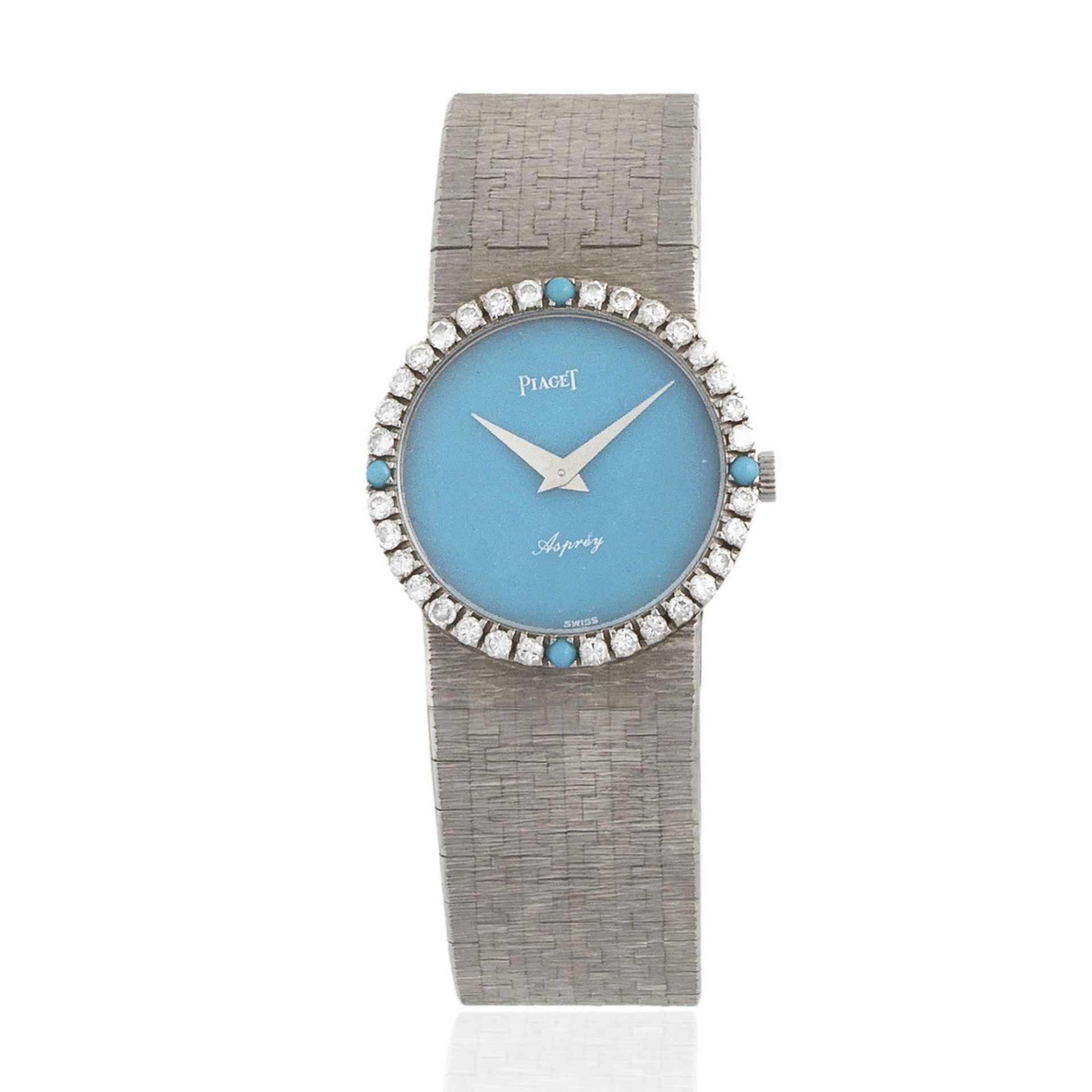 Piaget. A lady's 18K white gold and diamond set bracelet watch with turquoise hardstone dial Reta...