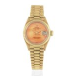 Rolex. A lady's 18K gold automatic calendar bracelet watch with coral dial Datejust, Ref: 6917, ...