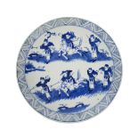 A blue and white small charger Bearing four-character Kangxi mark but 19th century