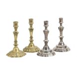 Two pairs of French seamed brass candlesticks Circa 1730-40