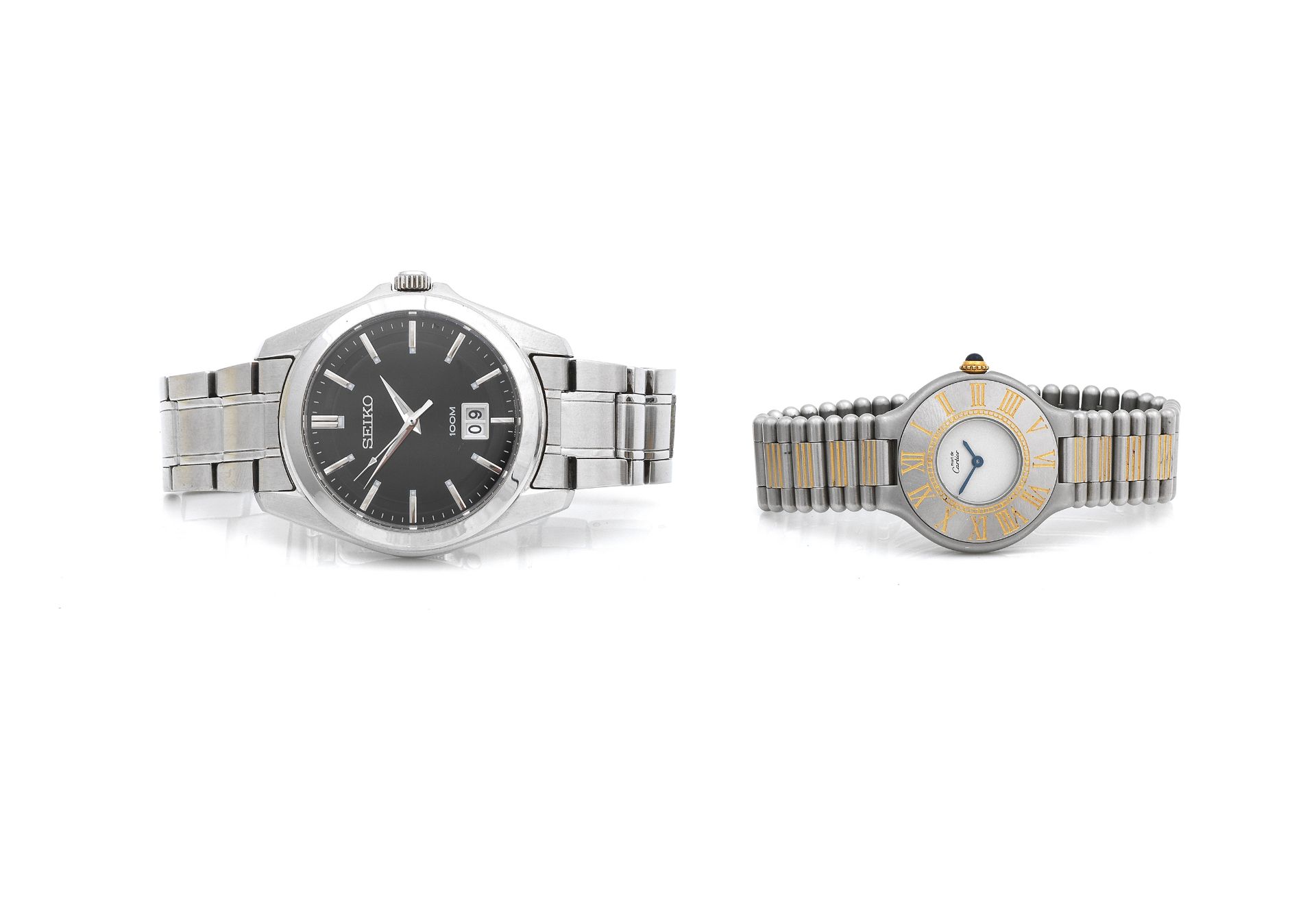 A lady's must de Cartier watch and a gent's Seiko watch