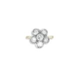 A diamond floral cluster ring