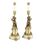 A pair of late 19th/early 20th century French ormolu and marble figural lamps (2)