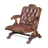 An unusual 19th century mahogany library armchair with an adjustable head rest