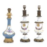 A PAIR OF FRENCH 19TH CENTURY PORCELAIN AND BRONZE MOUNTED TABLE LAMPS (3)