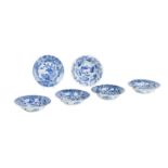 Five small blue and white deep plates, 18th century, (6)