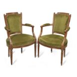 A pair of French late 18th century walnut fauteuils (2)