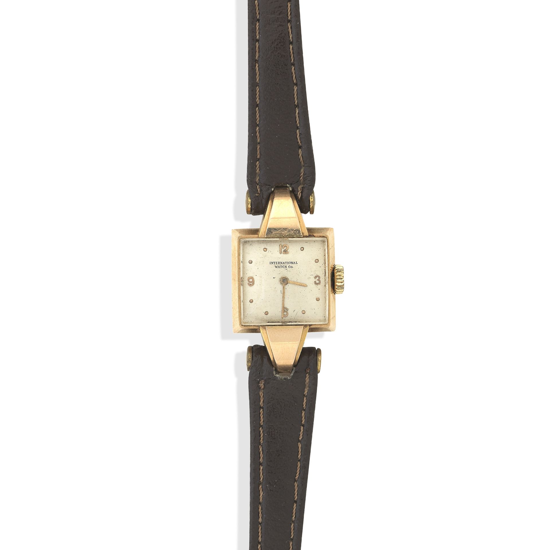 International Watch Company. An 18k gold ladies manual wind wristwatch