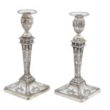 A pair of silver candlesticks maker's mark HE, Sheffield, 1899