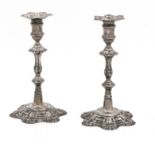 A pair of George III cast silver candlesticks by William Grundy, London, 1758