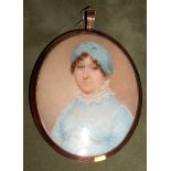 Manner of Manner of John Comerford, circa 1810 A Lady, wearing blue dress with frilled white coll...