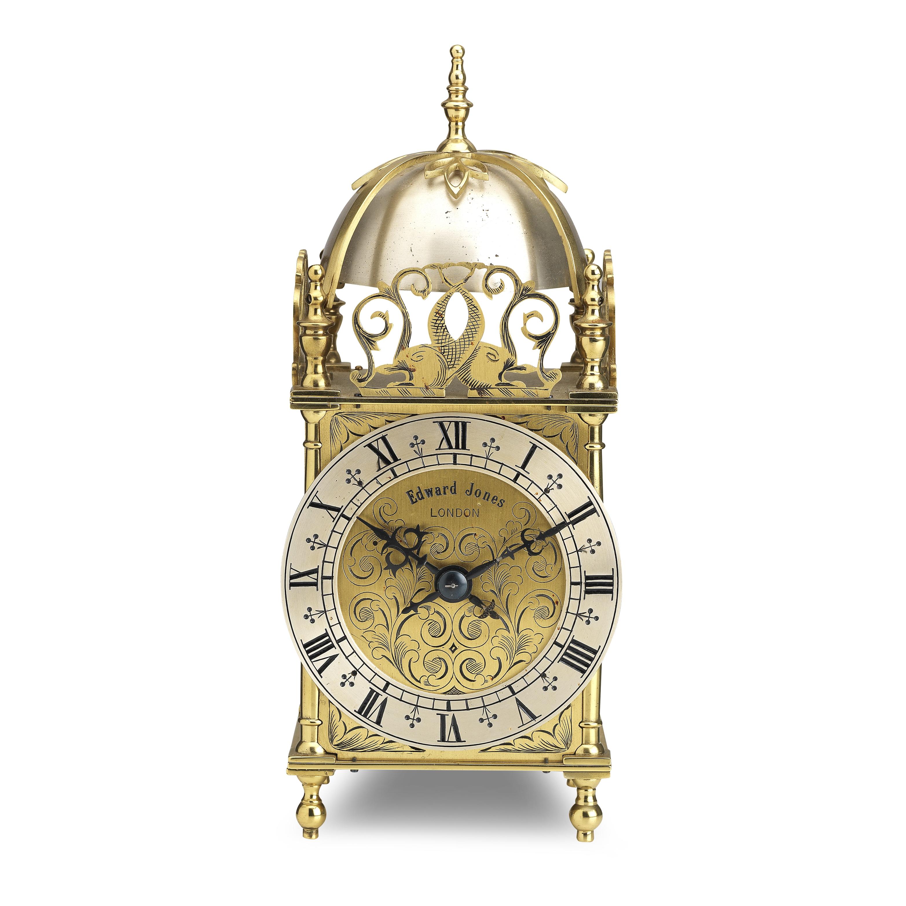 An early 20th century Lantern clock style timepiece Inscribed to the dial Edward Jones, London