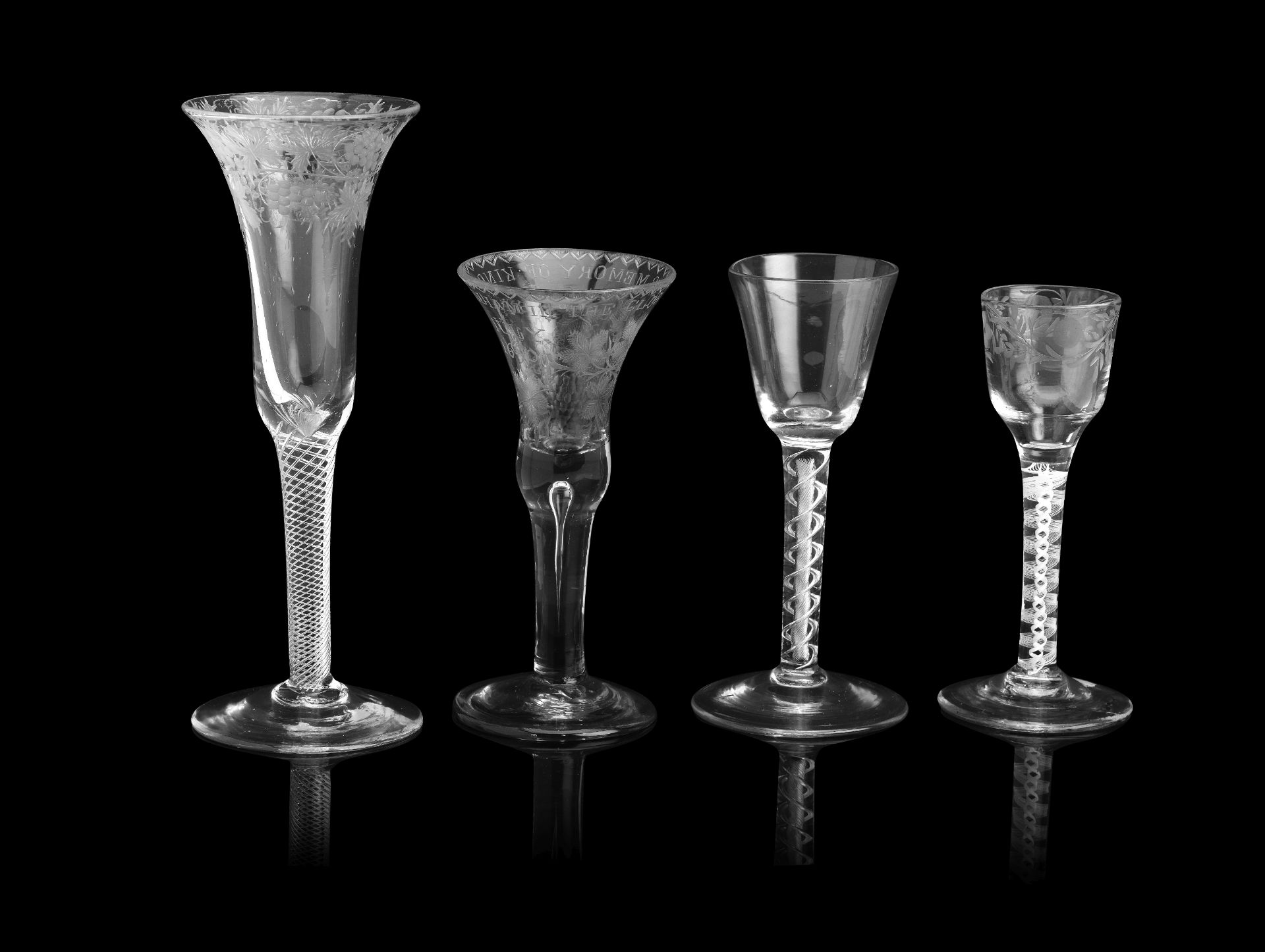 A Williamite engraved wine glass and three glasses with twist stems, circa 1740-65