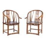 A PAIR OF HORSESHOE-BACK simulated bamboo armchairs ARMCHAIRS, QUANYI