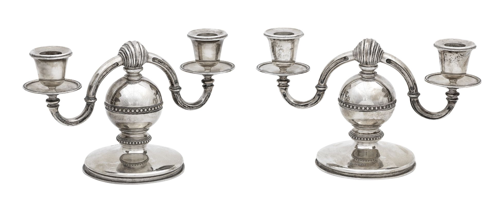 A pair of twin branch silver candelabra maker's mark AJA, Birmingham 1993 & 1995,