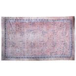 A large Ushak carpet 640 x 450cm