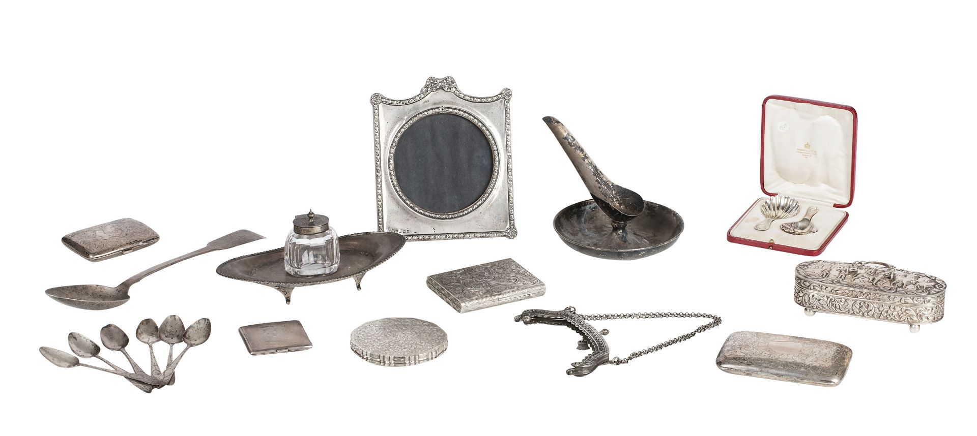 A collection of silver small items
