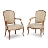 Two pairs of Louis XVI carved fruitwood fauteuils