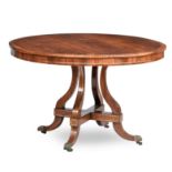 A 19th century rosewood circular breakfast table