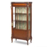 A late 19th century gilt metal mounted inlaid mahogany and marquetry inlaid display cabinet